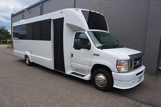 white party bus for 28 passengers